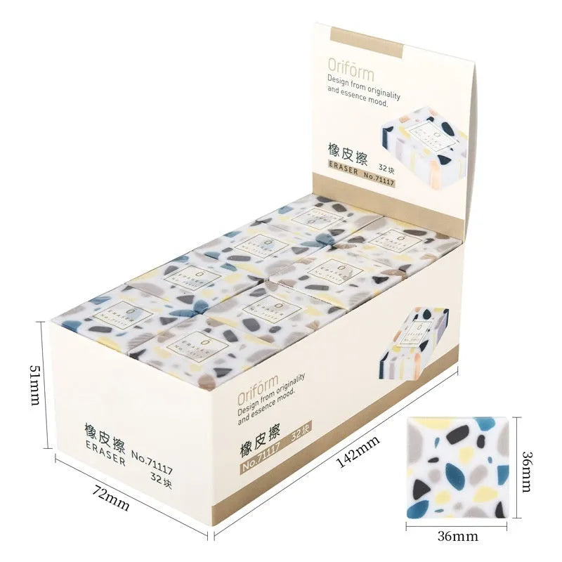 White rubber brick-format eraser for students on a plain background