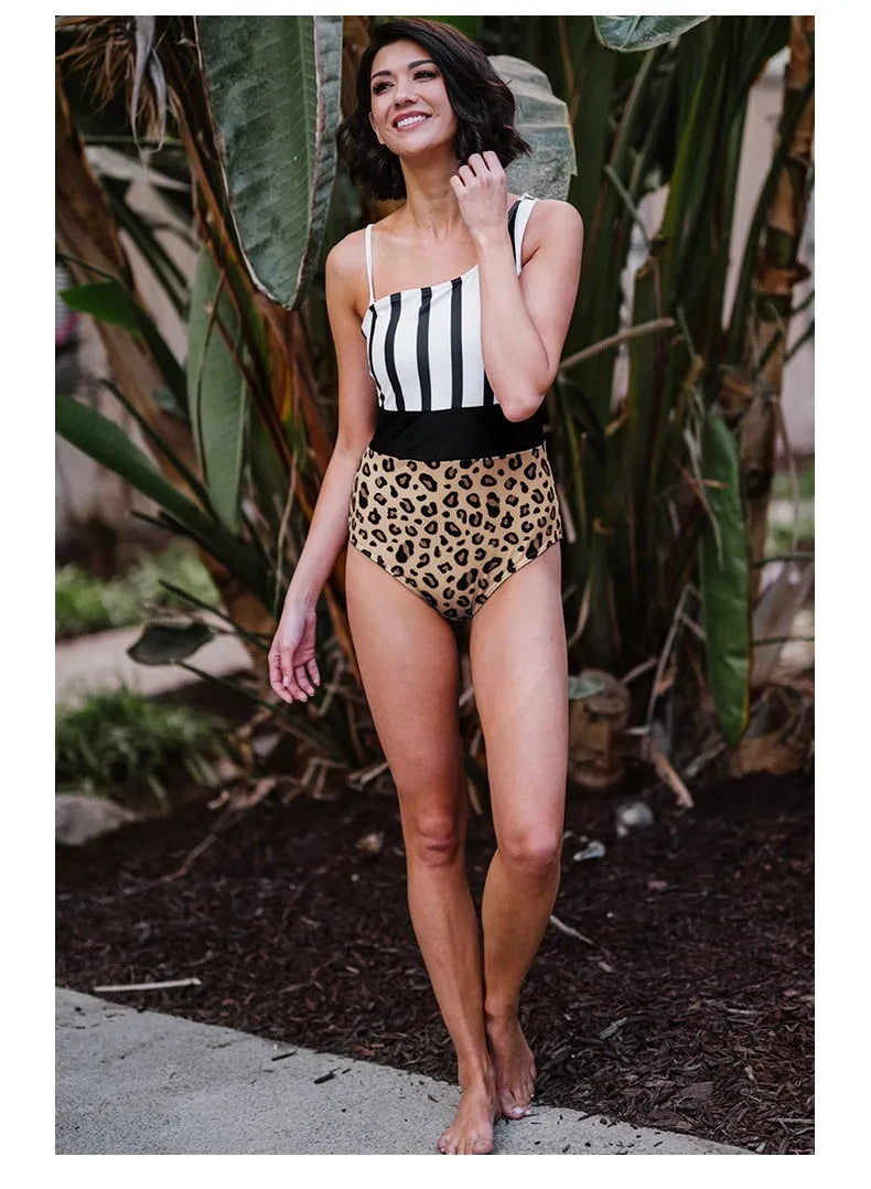 Leopard print women's one-piece swimsuit with asymmetric collar and high waisted briefs style.