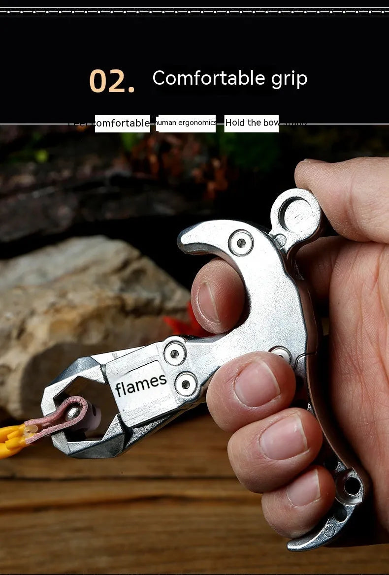 Close-up of a zinc alloy archery release aid showing its two-axis harpoon clip mechanism.