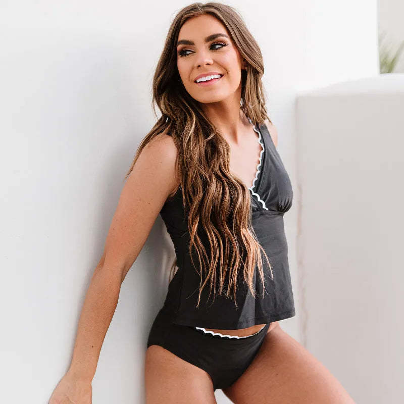 Solid black women's sleeveless swimsuit bikini set on size chart
