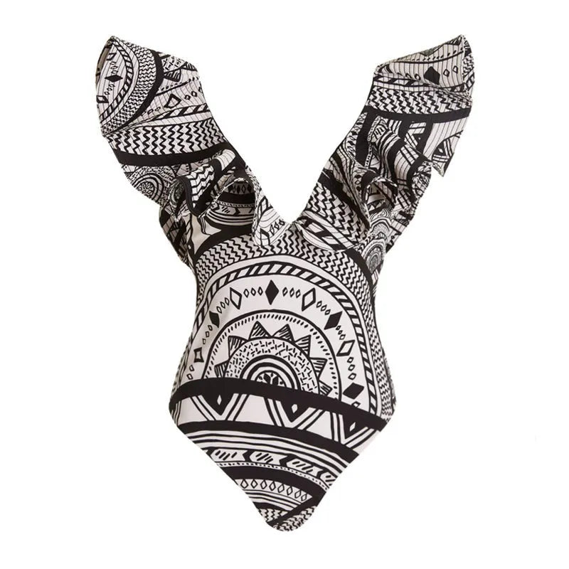 Women's vintage print one-piece swimsuit with deep V-neck and ruffles, plus matching wrap skirt.