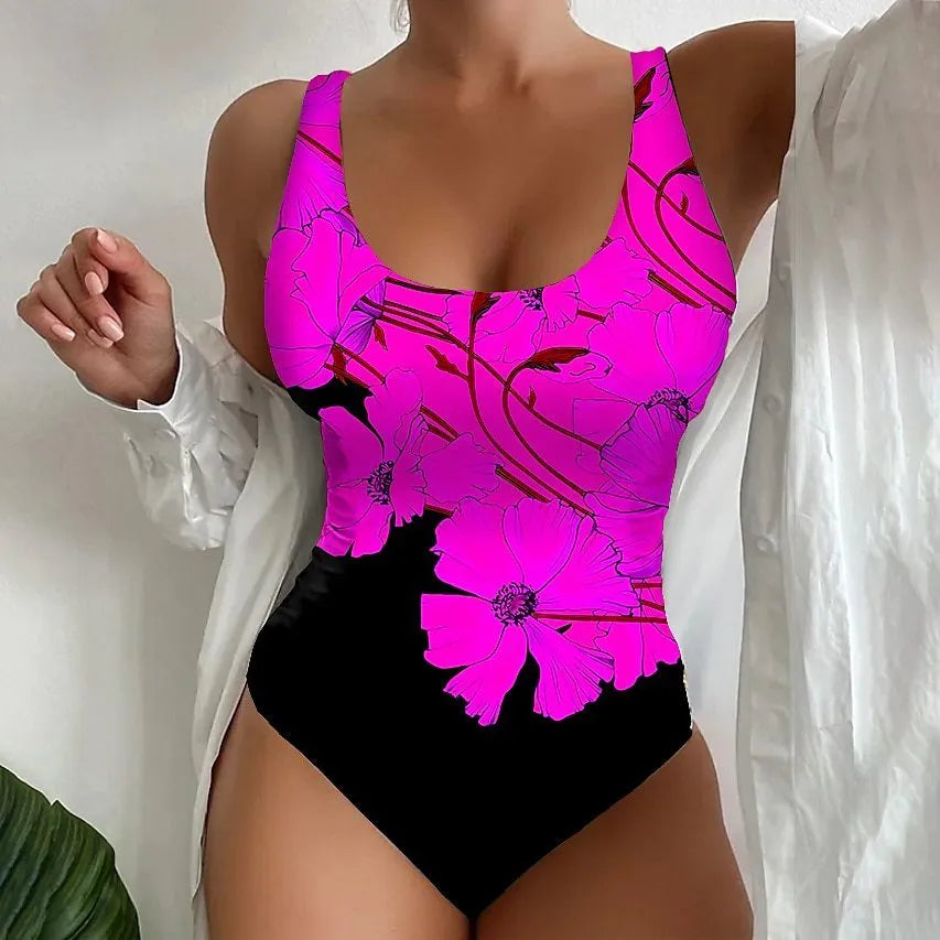 Women's one-piece swimsuit with 3D printed pattern in orange red, purple, and sky blue colours