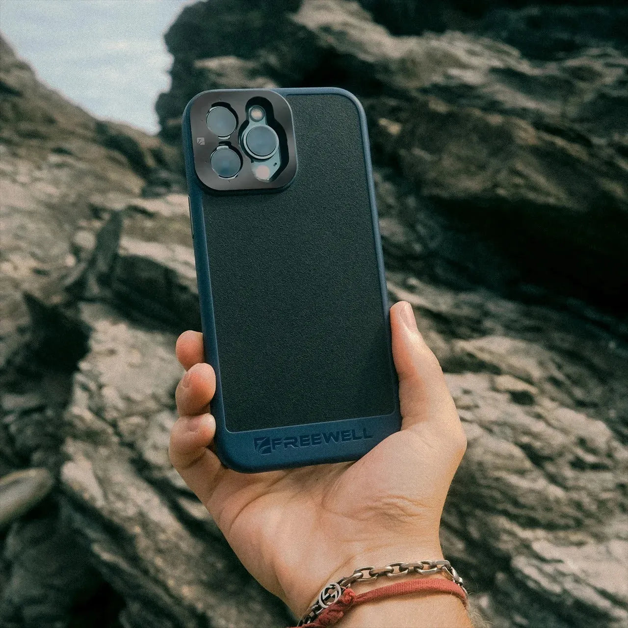 Black phone case compatible with iPhone 13 Pro, 14 Pro, and 15 Pro models including Pro Max variants