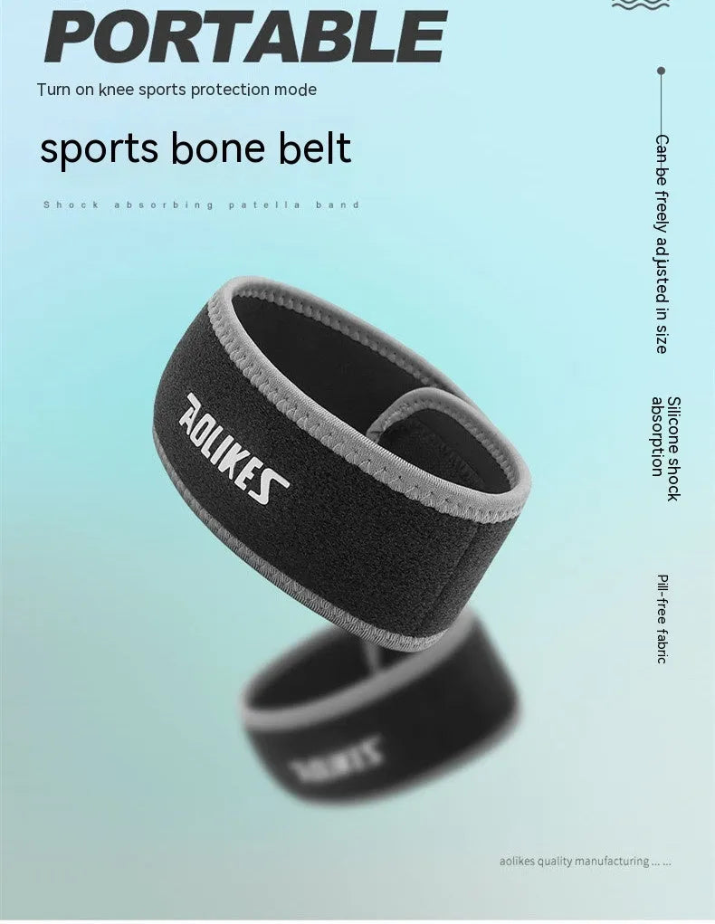 Black and grey edged patella retinaculum knee support for adult sports.