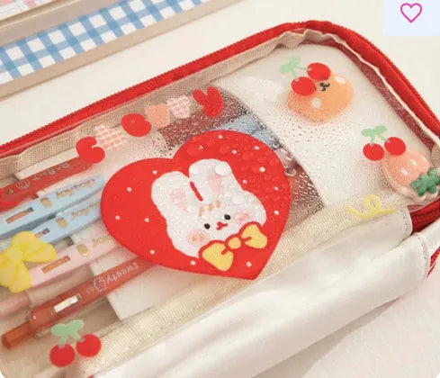 Transparent heart-design pencil case with TPU material showing pens inside