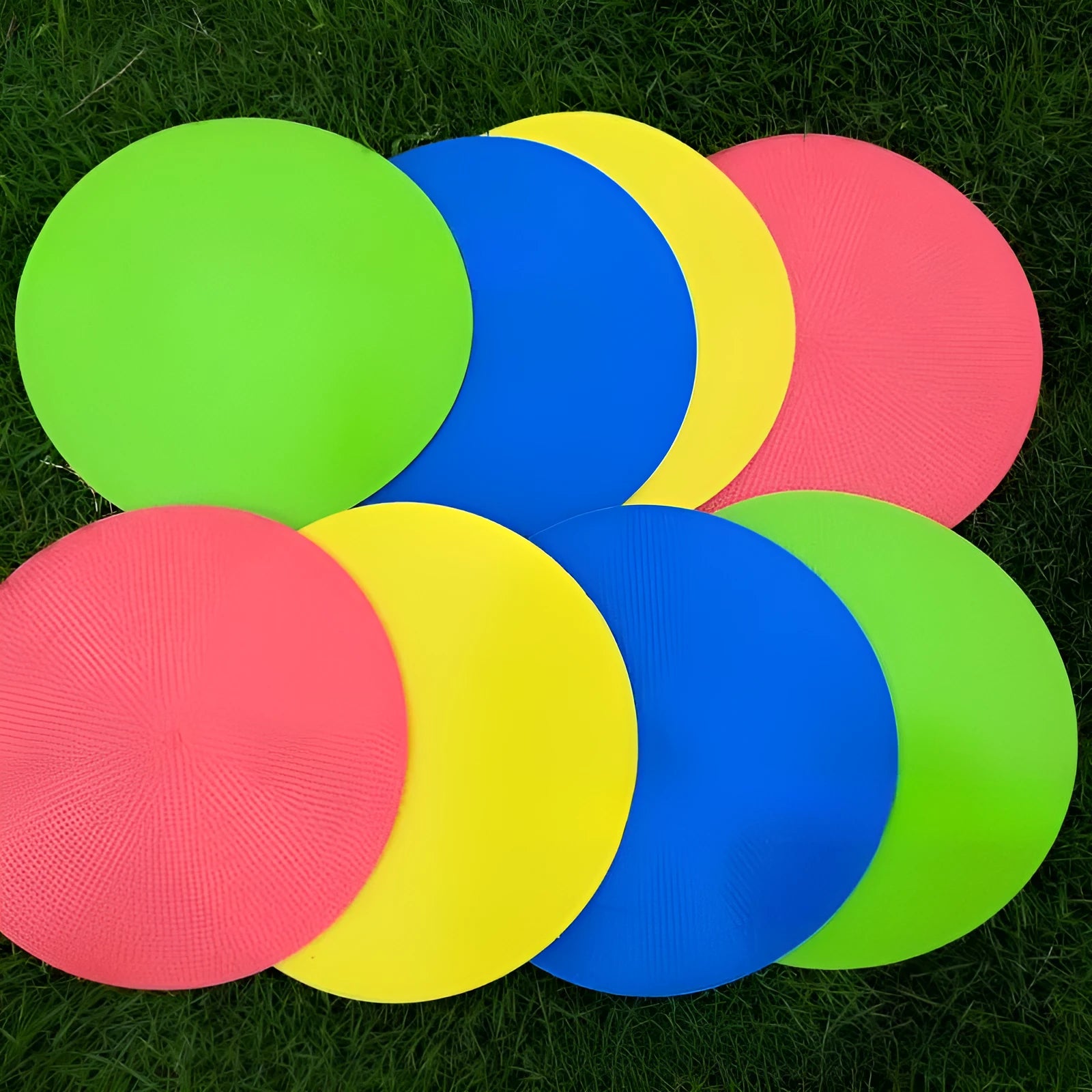 Football training target pad disc measuring 23cm in diameter with 3mm thickness in bright colour options