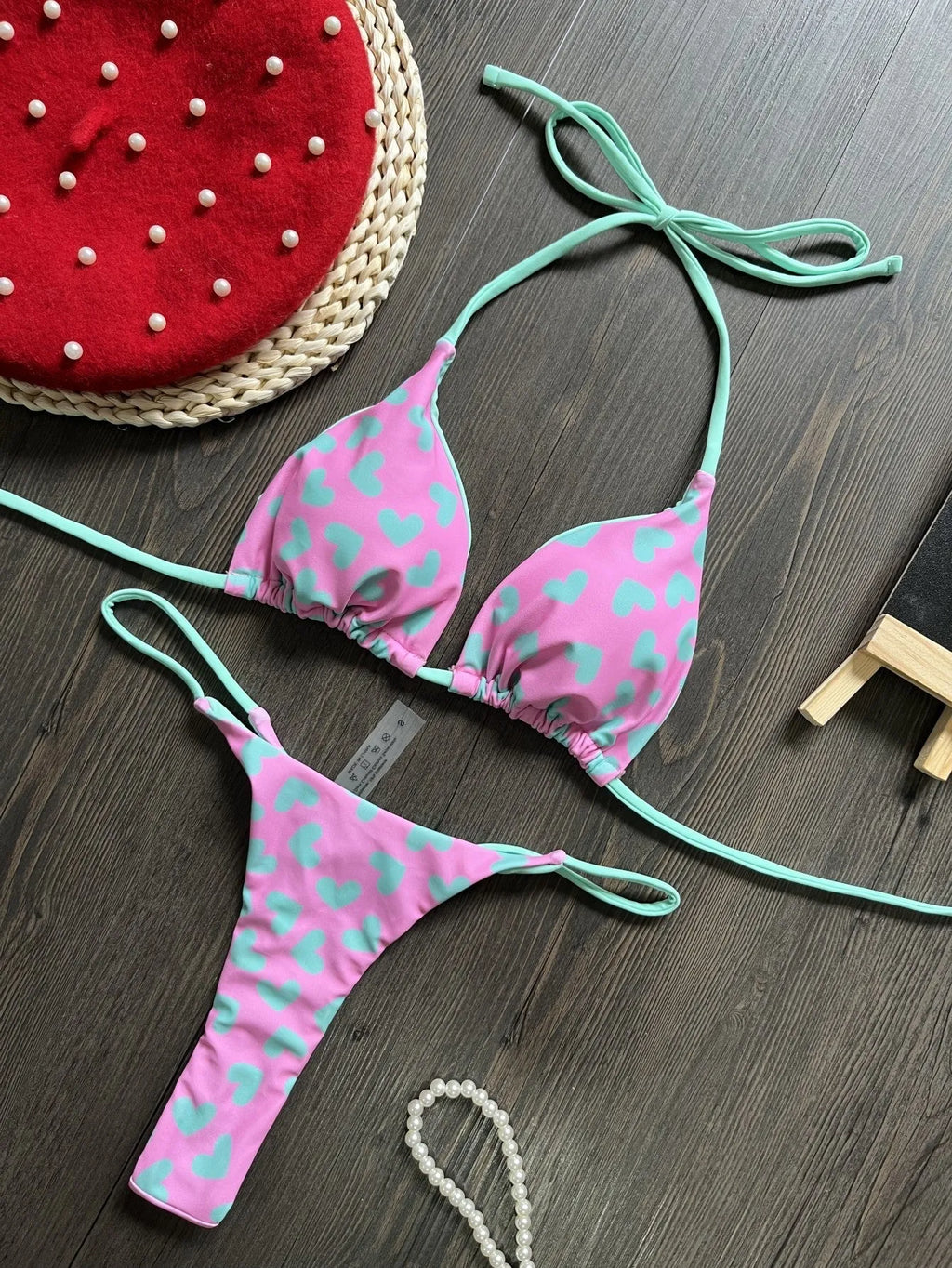 Sexy backless split swimsuit with heart printing in blue and pink colour options