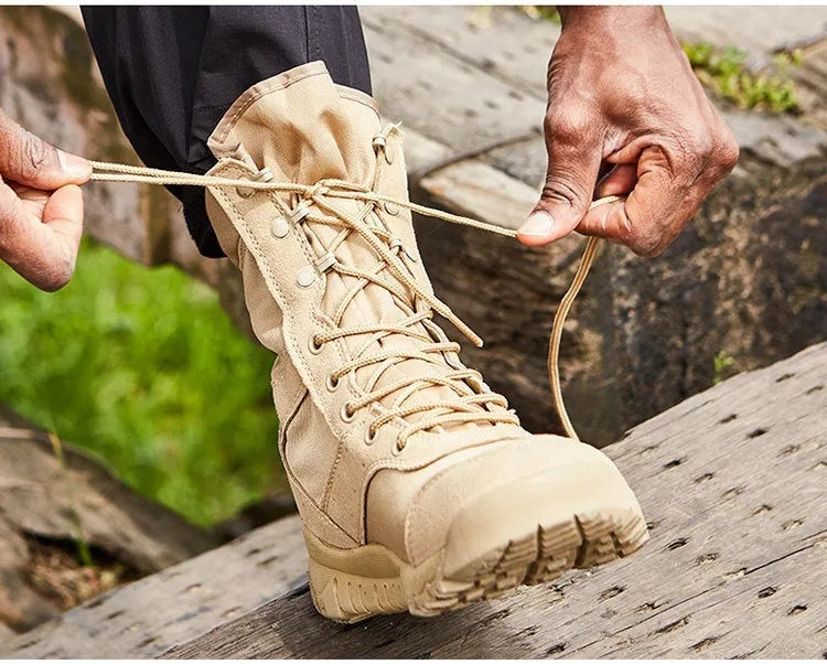 Black and sand coloured Yulong tactical combat boots for outdoor hiking and sports.