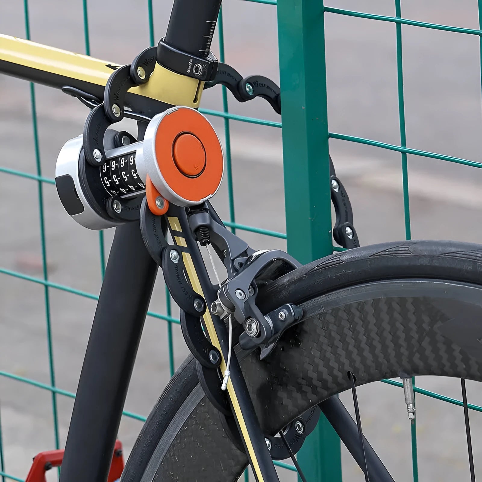 Portable bicycle folding lock in black or black orange with multiple material construction