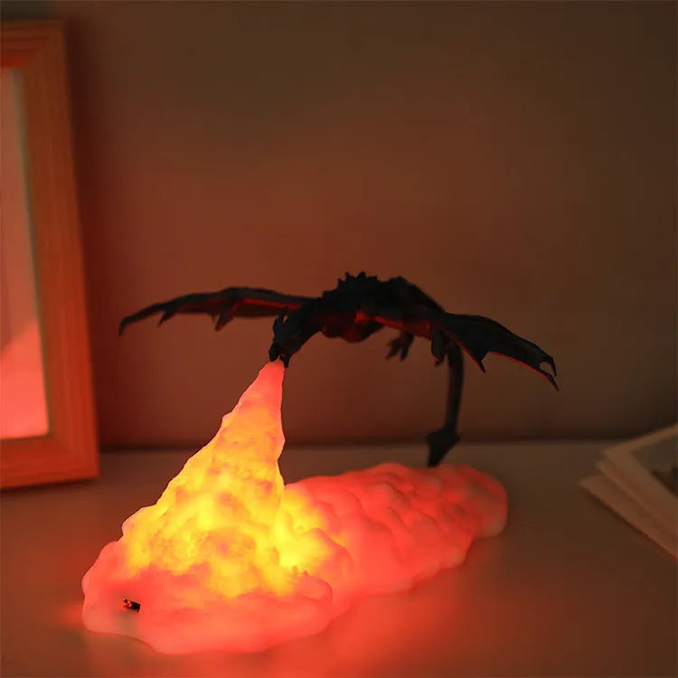 3D printed dragon-shaped night lamp with warm red glowing light effect on a dark background.