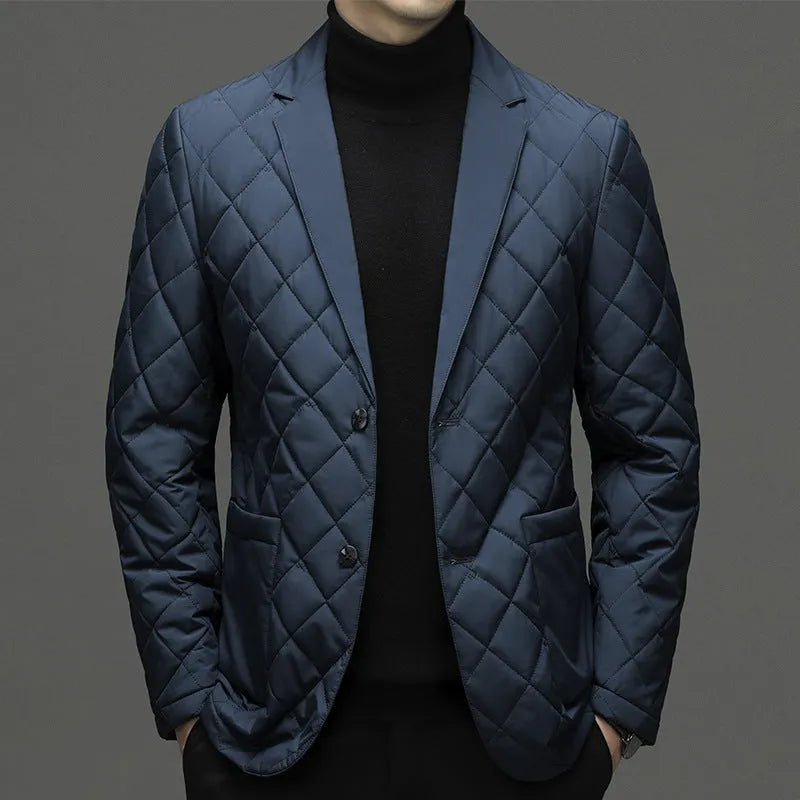 A man wearing a solid-colour thick down jacket with a lapel and side seam pockets.