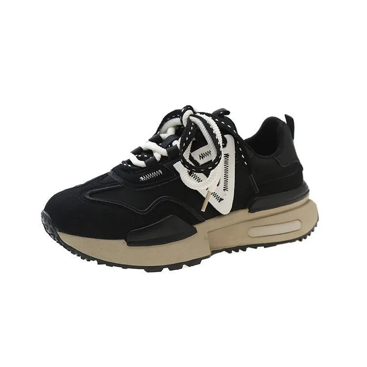 Retro platform sports shoes in black with round toe and front lace-up design