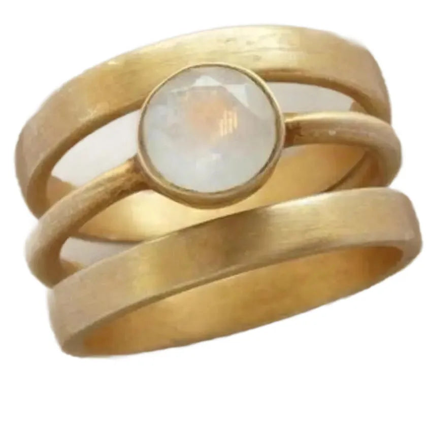 Gold-plated titanium steel ring with hollow geometric design and micro-inlaid white chalcedony.