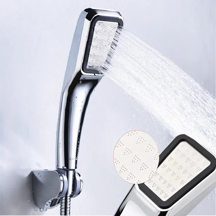 Orange hand-held pressurised shower set with rain function and multiple shower head options