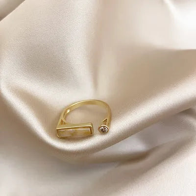 Copper vintage zircon marble ring with electroplated gold finish and adjustable opening, beige colour