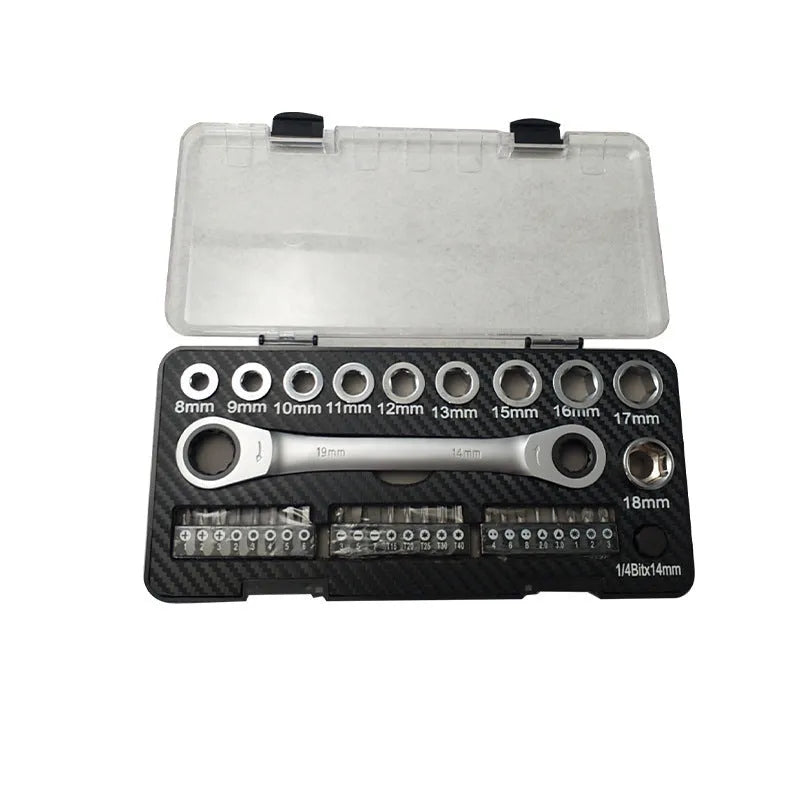 Ratchet wrench set with two-way ratchet mechanism, ten sockets, and three bit heads laid out on a surface