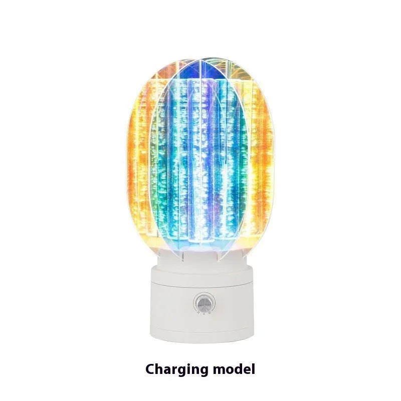Creative small night lamp with rotating head and dimmable light on a table