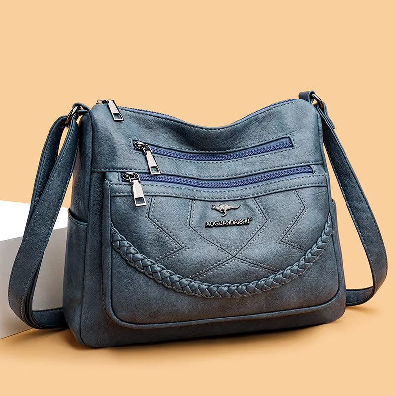 Soft PU leather women's crossbody shoulder bag in horizontal square shape with zippered pockets