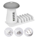 White mushroom-shaped LED desk lamp with 5 USB charging ports on a wooden desk