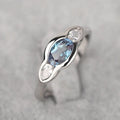 Women's geometric ellipse ring with white gold colour finish and inlaid zircon stones