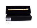 Silver inkless metal pen with alloy tip, spare nib, and presentation box on a desk.