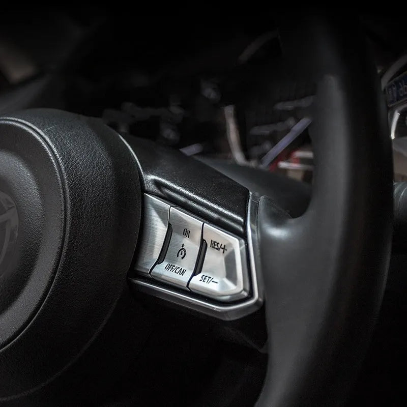 Aluminium alloy decorative stickers for car steering wheel buttons in transparent, red, silver, and blue finishes