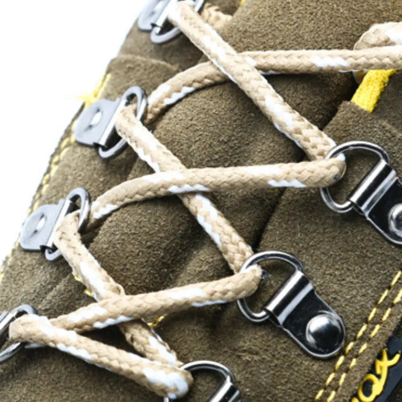 Bronze-coloured leather safety shoes with a steel toe cap and textured anti-slip sole.