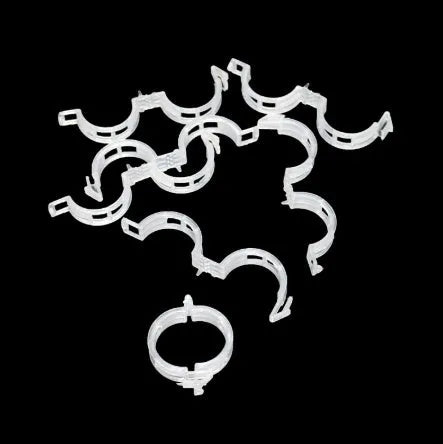 Set of 50 plastic garden plant clips for supporting tomato vines and flower stems.