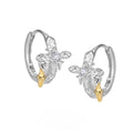 XINGX geometric cross earrings in 925 sterling silver with white gold finish and round design elements
