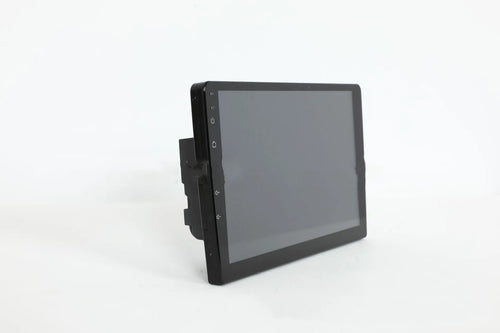 10.1 inch Android universal car machine with trapezoid panel and connection ports visible