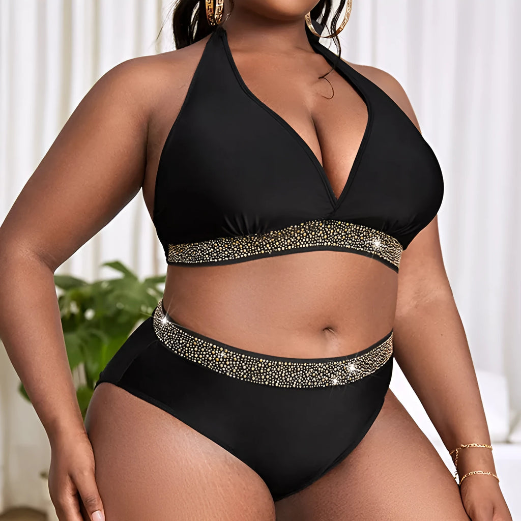 Black plus size women's two-piece bikini swimsuit on hanger