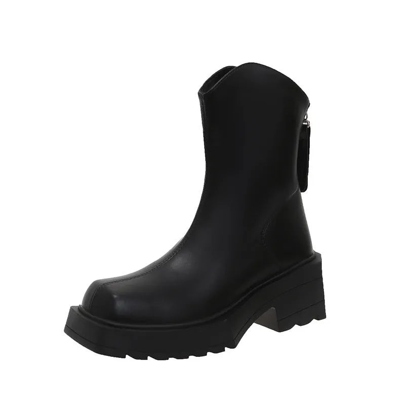 Women's black square-toe platform Martin boots with a block heel and rear zip on a white background