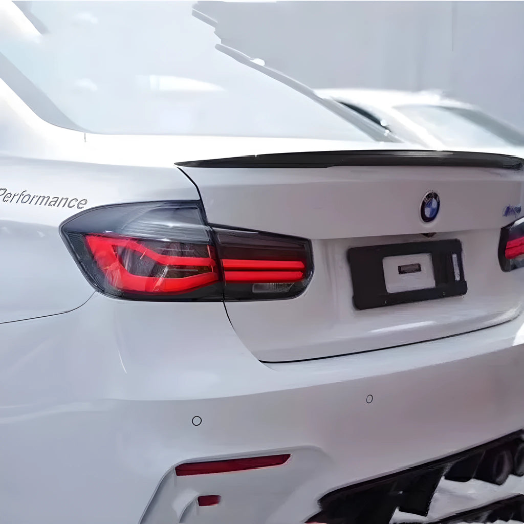 BMW 3 Series replacement tail light assembly with LED streamer lights in red or smoked black finish.