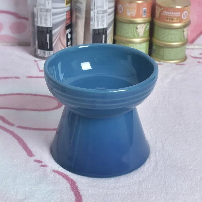 Ceramic pet bowl with high foot design showing anti-tumble stability feature