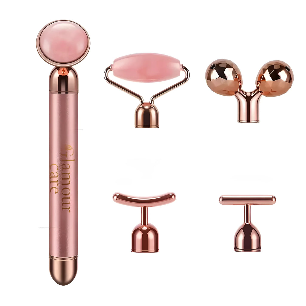 Rose gold five-in-one vibrating face lifting machine with four interchangeable jade and beauty heads in a compact box