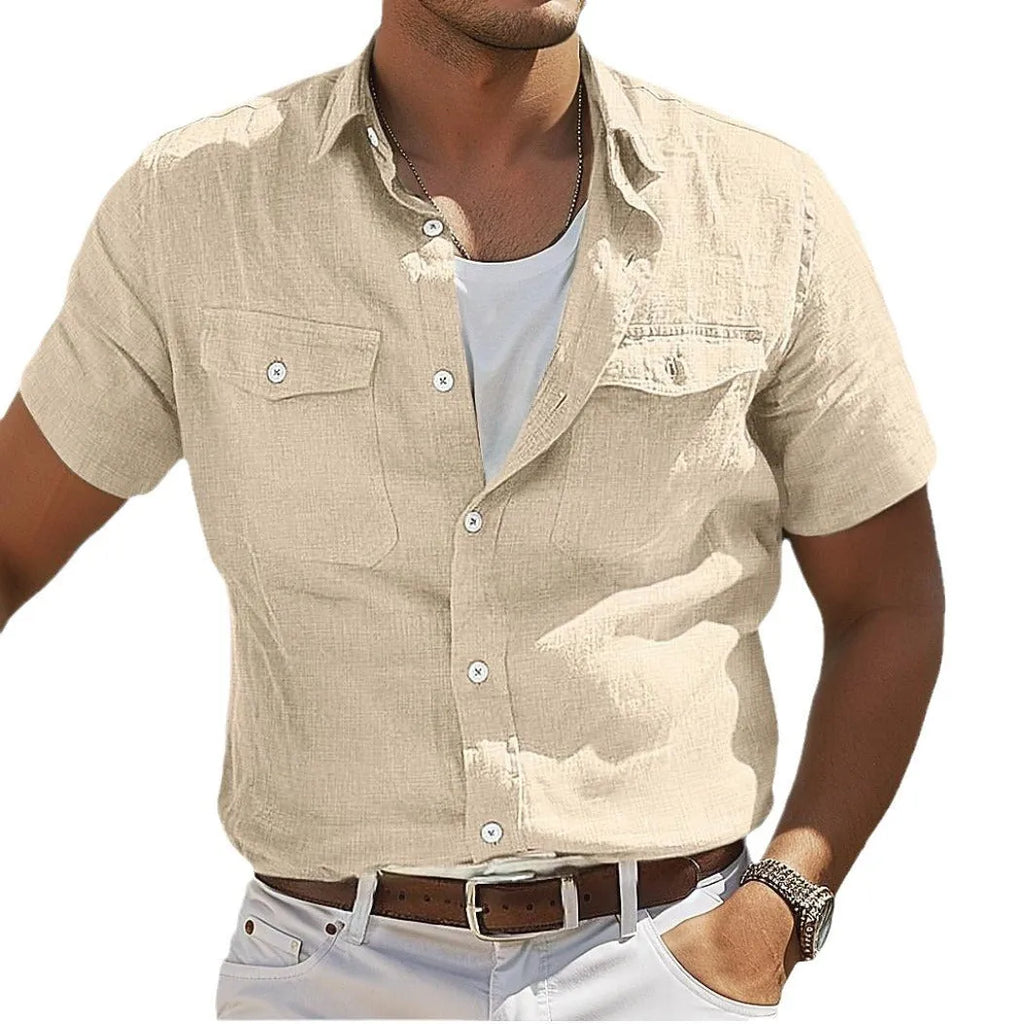 Men's loose-fitting grey cotton shirt with polo collar and long sleeves for casual summer wear.