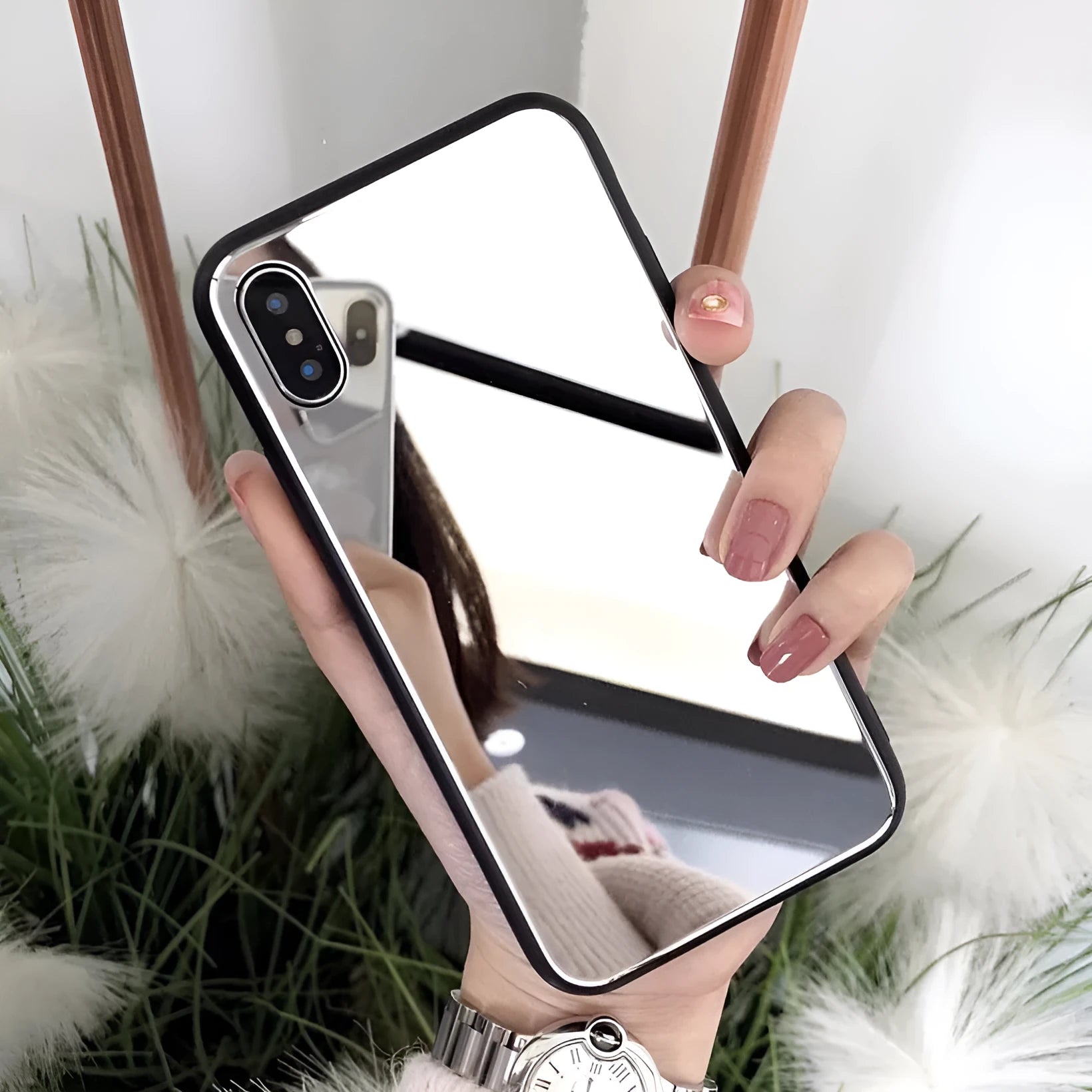 Black clear glass iPhone mirror phone case showing reflective surface and iPhone compatibility