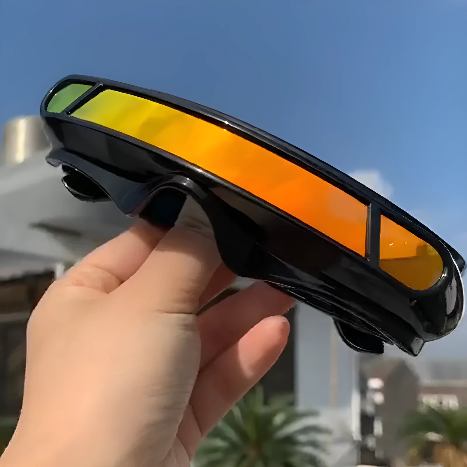 Black full rim sports sunglasses with polarised PC lenses shown in blue mercury tint.