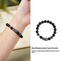Men's black obsidian and sterling silver snake bracelet with retro Zodiac design