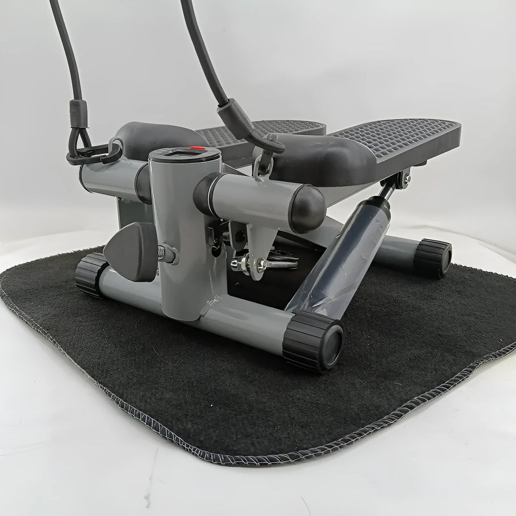 Silver grey hydraulic resistance mini treadmill and pedal machine for home gym waist slimming workouts.