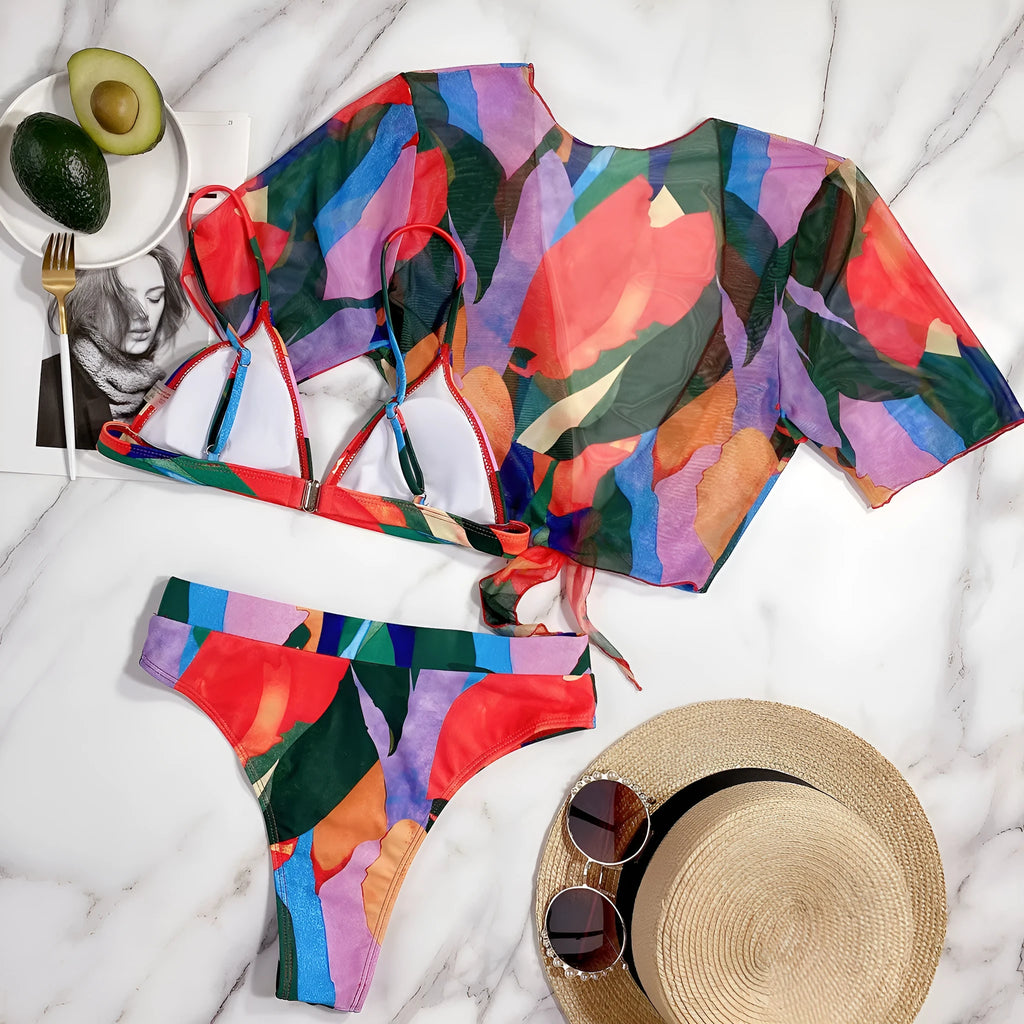 Red women's split swimsuit in nylon fabric for swimming and surfing.