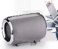 Portable metal-cased subwoofer sound system with buttons, available in black, blue, golden, red, or silver
