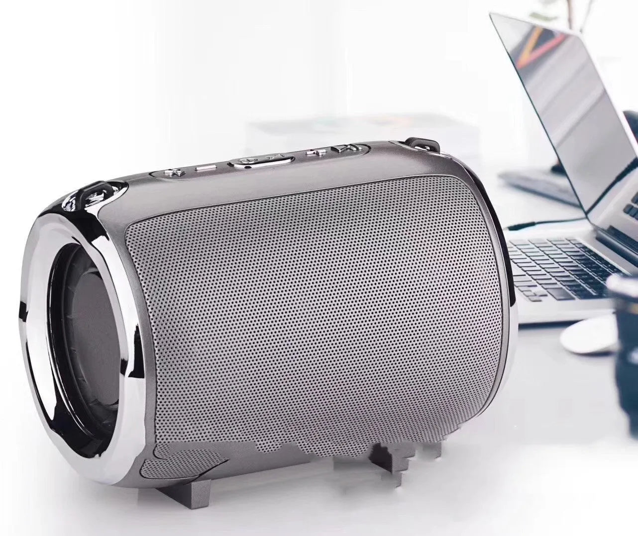 Portable metal-cased subwoofer sound system with buttons, available in black, blue, golden, red, or silver
