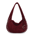 Women's soft plush underarm tote handbag in retro styling showing black, red, brown and green colour options