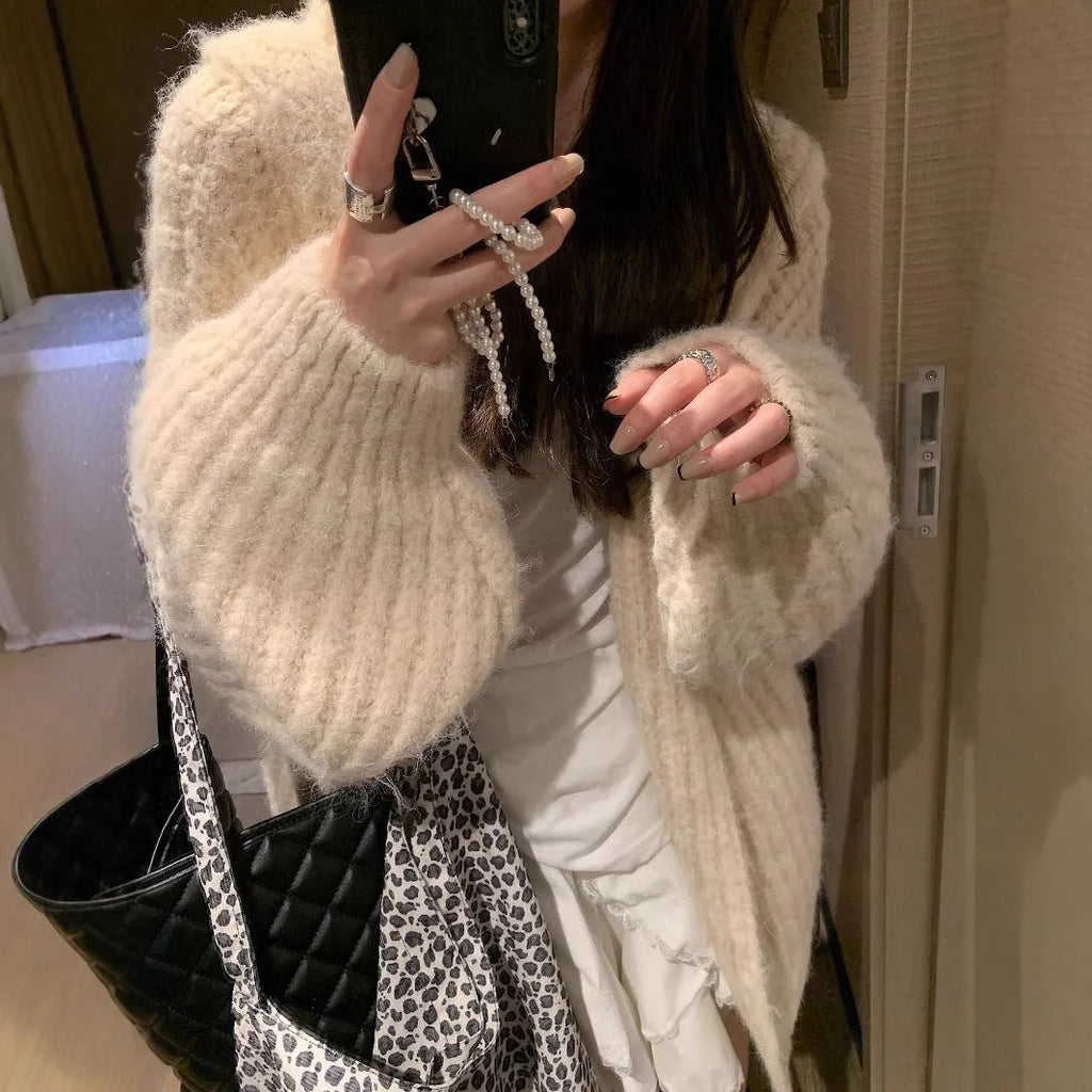 Women's thick grey hooded cardigan sweater with loose fit and regular sleeves