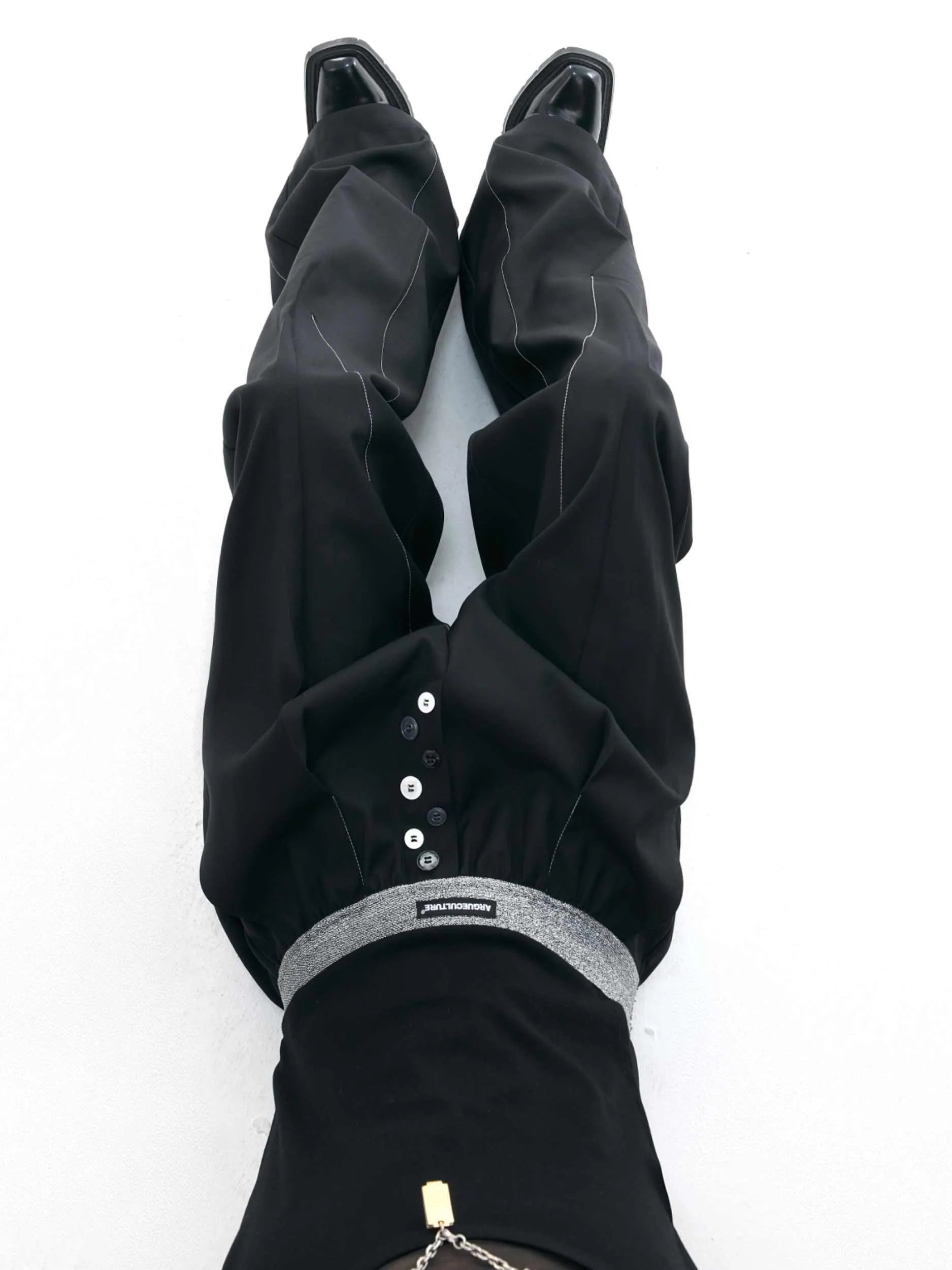 Straight-leg casual trousers with button open line design in black high waist style