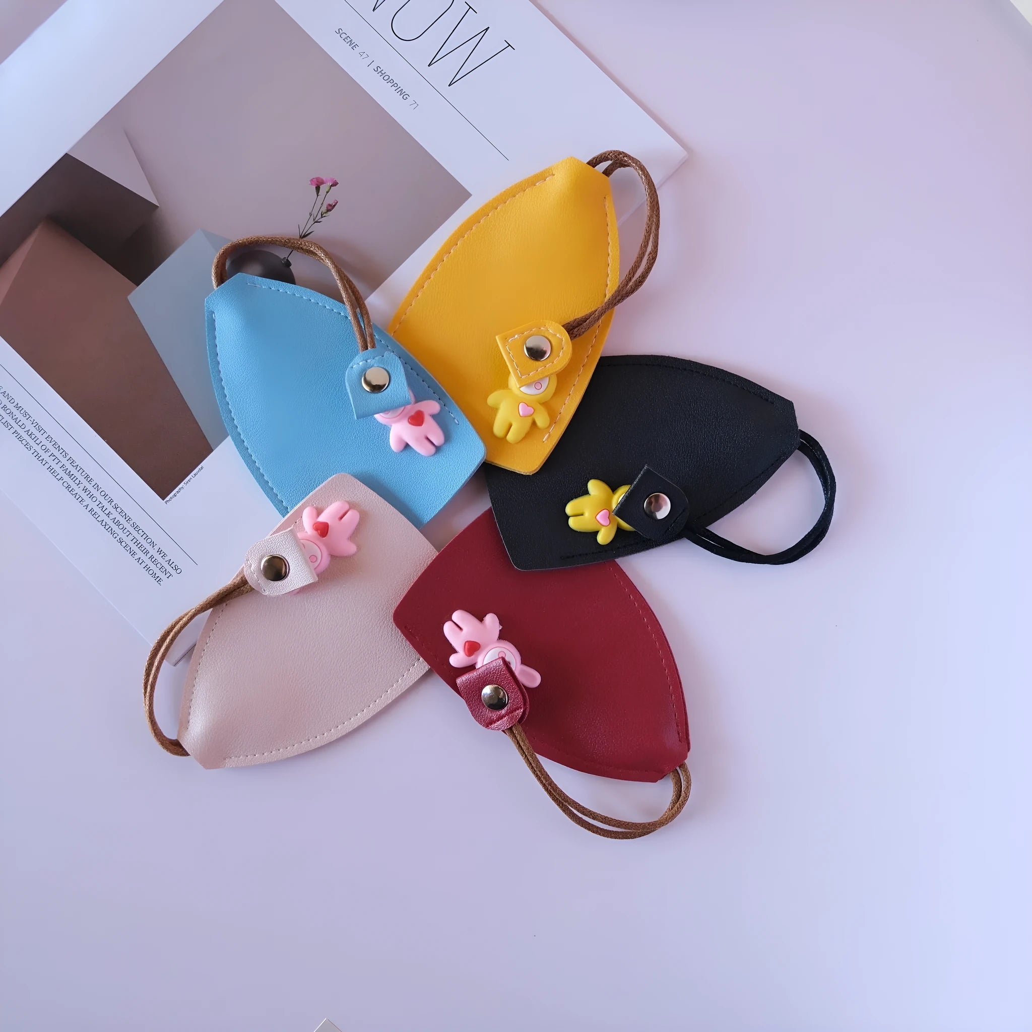 Universal large capacity PU leather car key case in various colours with credit card storage slots.