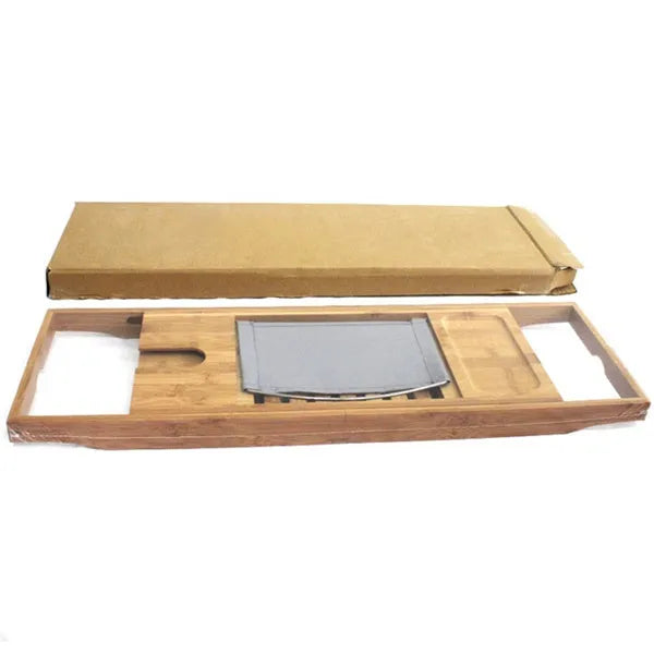 Bamboo single-tier desktop storage rack for bathroom organisation next to a bathtub.