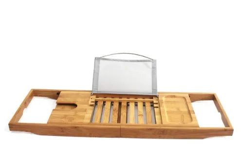 Bamboo single-tier desktop storage rack for bathroom organisation next to a bathtub.
