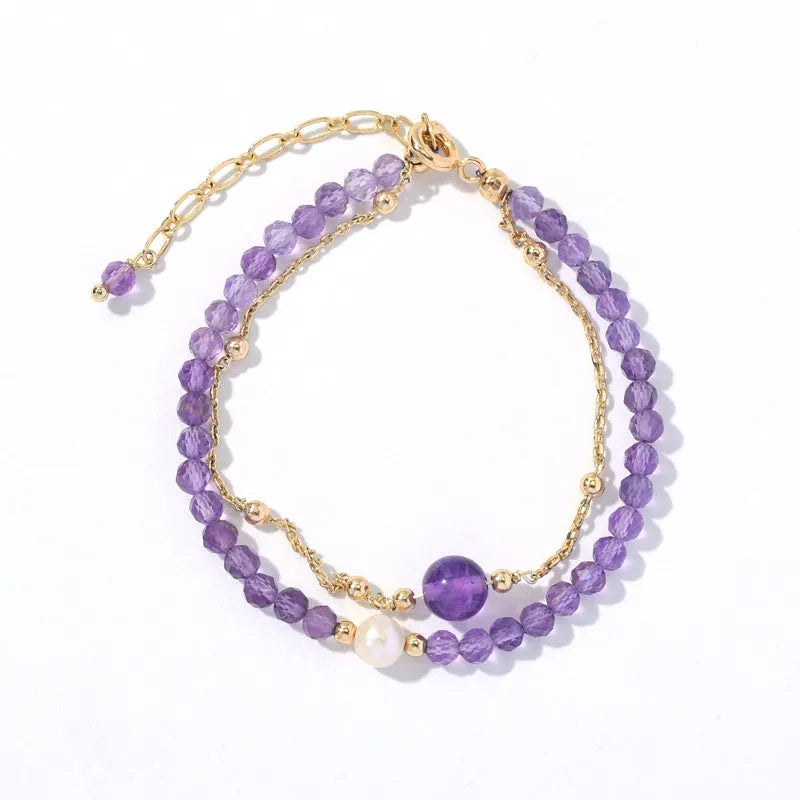 Purple amethyst crystal bracelet with diamond-shaped beads in a Chinese style design.